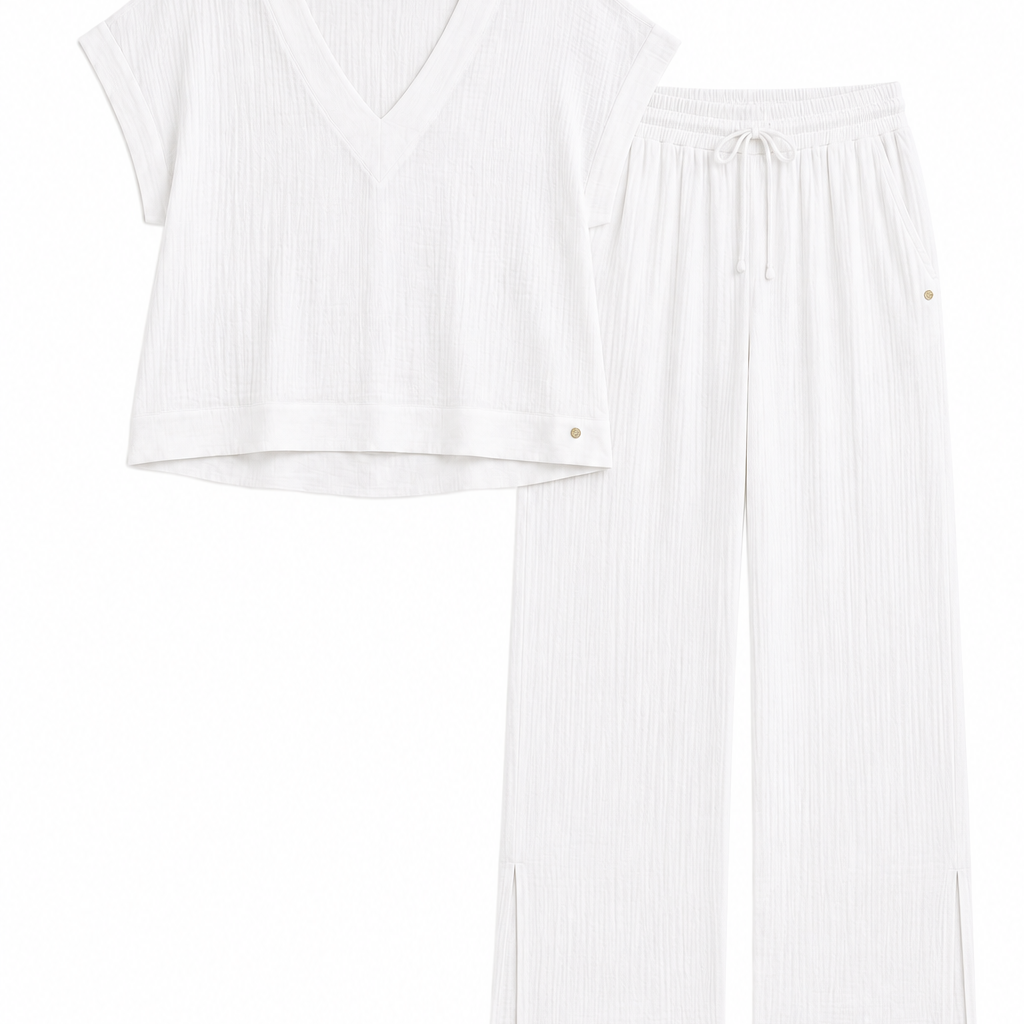 A two-piece white loungewear set featuring a short-sleeve V-neck ribbed crop top and matching wide-leg drawstring pants, displayed on a clean white background.